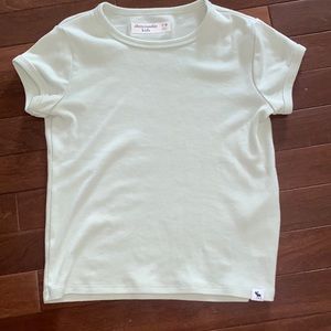 Abercrombie kids light green shirt.